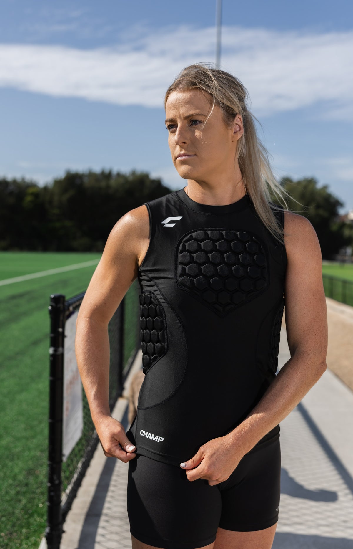 Female footy player wearing the CHAMP C1 Guard-Vest