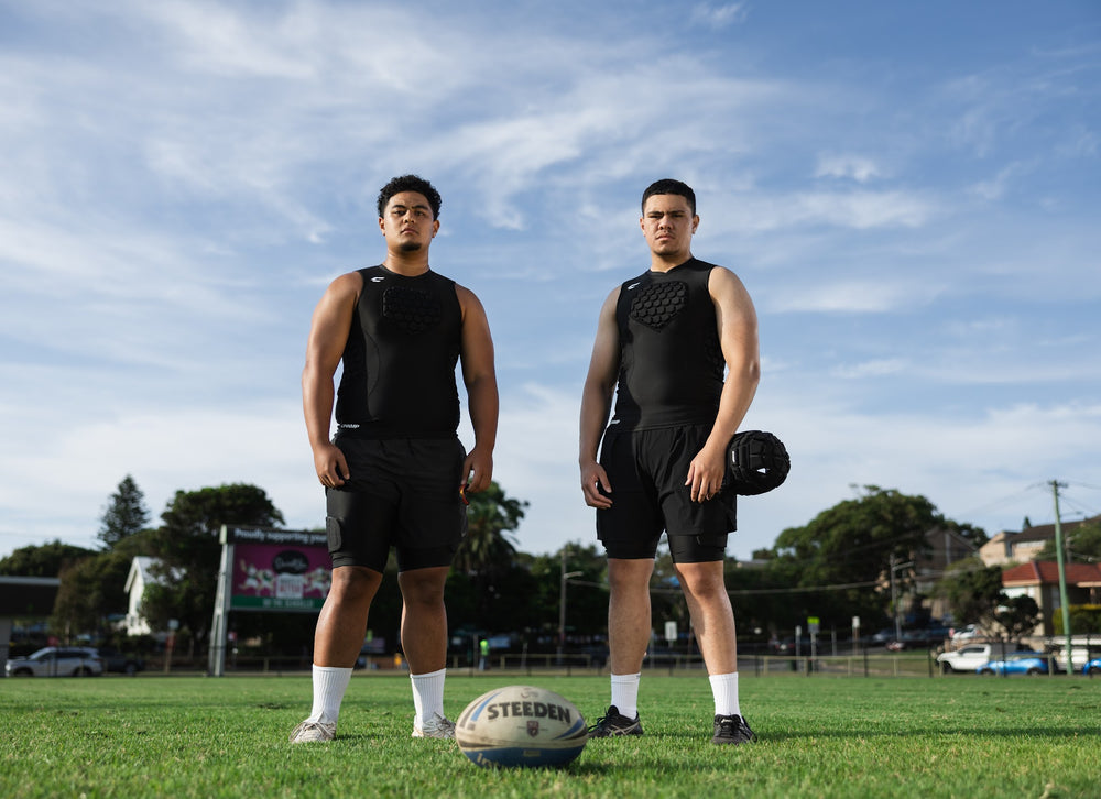Two rugby players wearing CHAMP C1 Guard-Vests